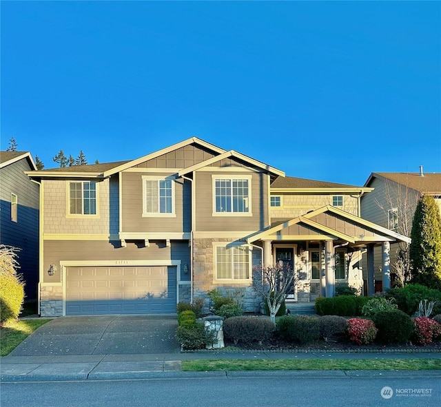 craftsman house featuring a garage