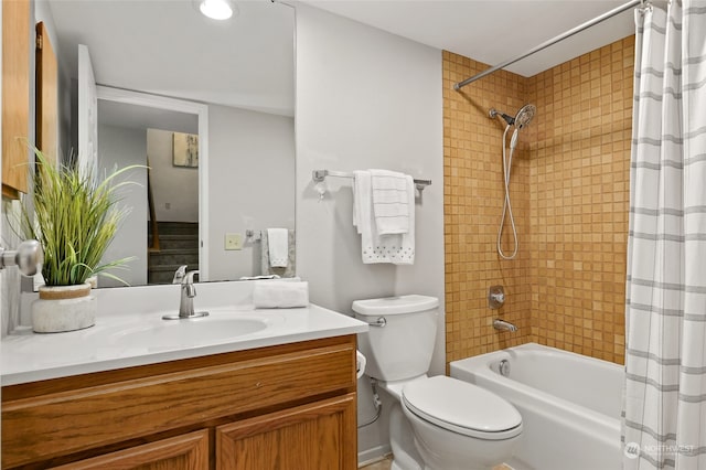 full bathroom with shower / bath combination with curtain, vanity, and toilet