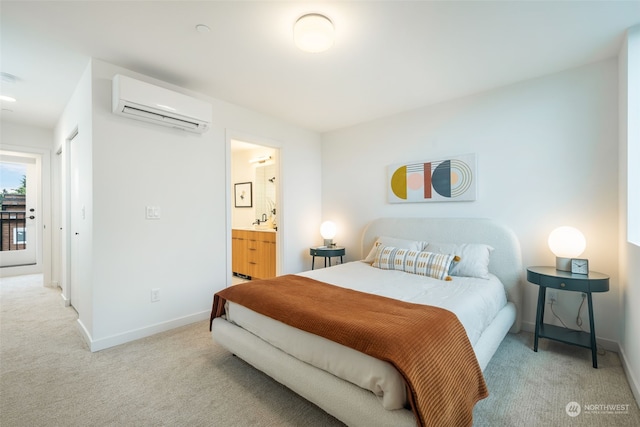 carpeted bedroom with ensuite bathroom and an AC wall unit