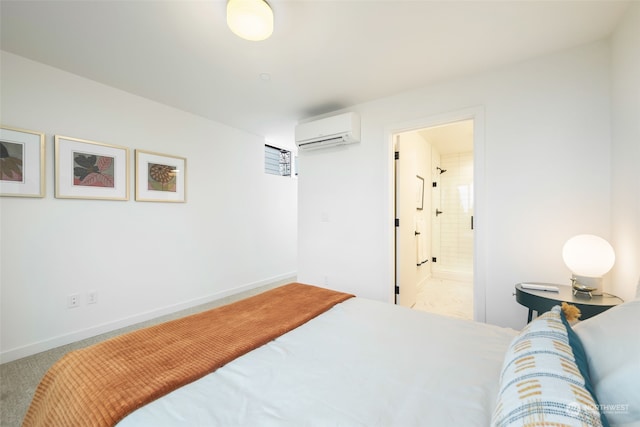 carpeted bedroom with ensuite bath and a wall mounted AC