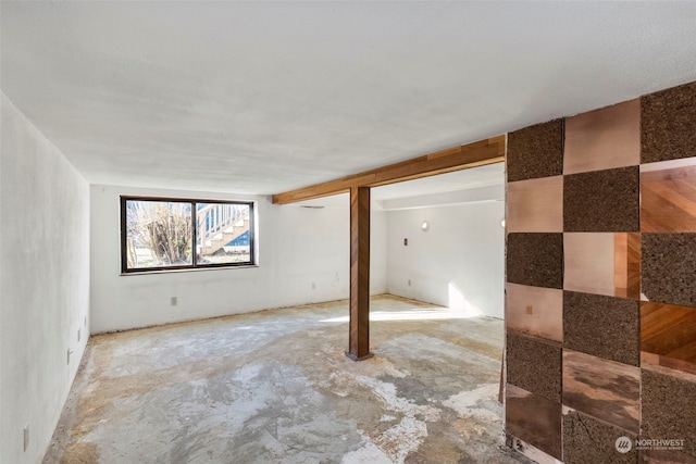 empty room featuring concrete flooring