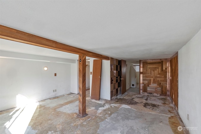 basement with a textured ceiling