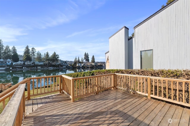 deck featuring a water view