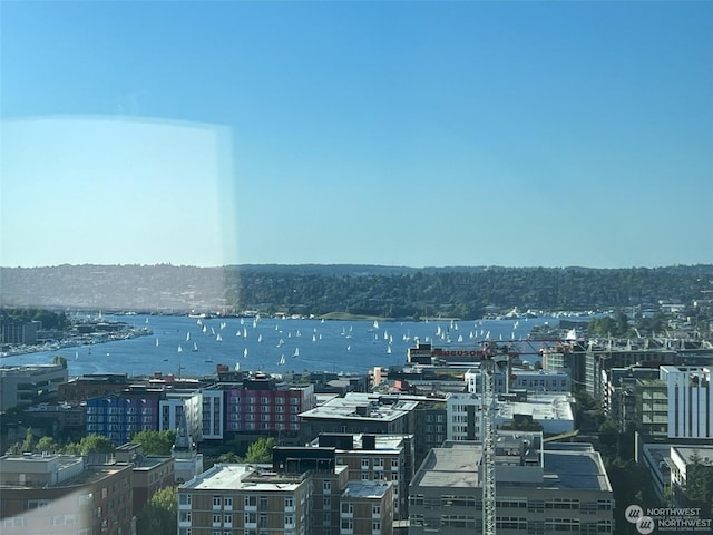 property's view of city with a water view