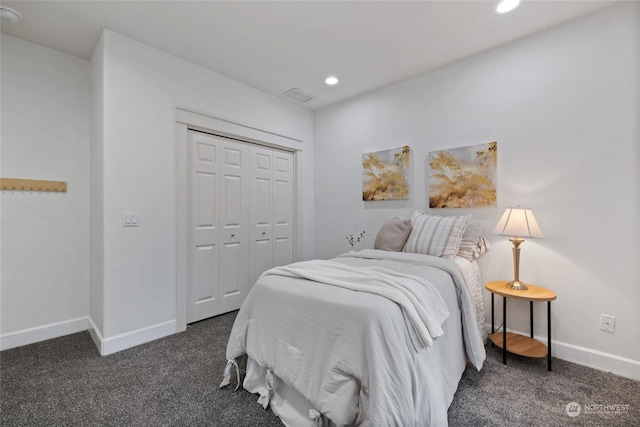 carpeted bedroom with a closet