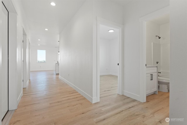 corridor featuring light wood-type flooring