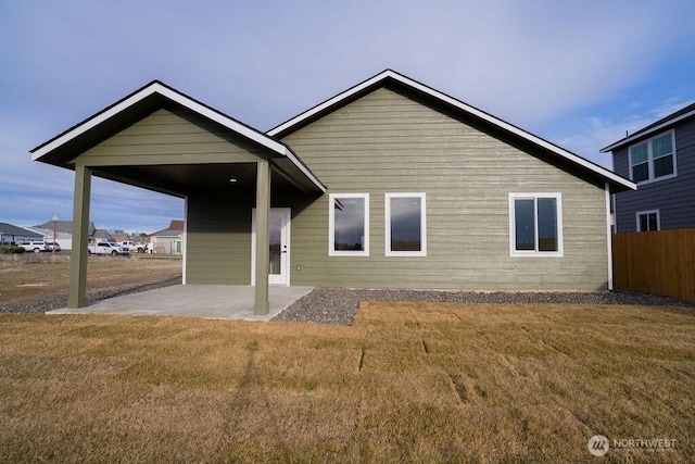 1300 Marina Dr Unit 12, Moses Lake, WA 98837 - back of property with a yard, a patio, and fence