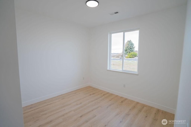 1300 Marina Dr Unit 12, Moses Lake, WA 98837 - unfurnished room with visible vents, baseboards, and wood finished floors