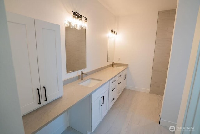1300 Marina Dr Unit 12, Moses Lake, WA 98837 - full bathroom featuring double vanity, baseboards, marble finish floor, and a sink