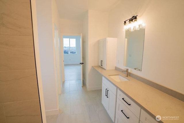 1300 Marina Dr Unit 12, Moses Lake, WA 98837 - bathroom featuring baseboards and vanity