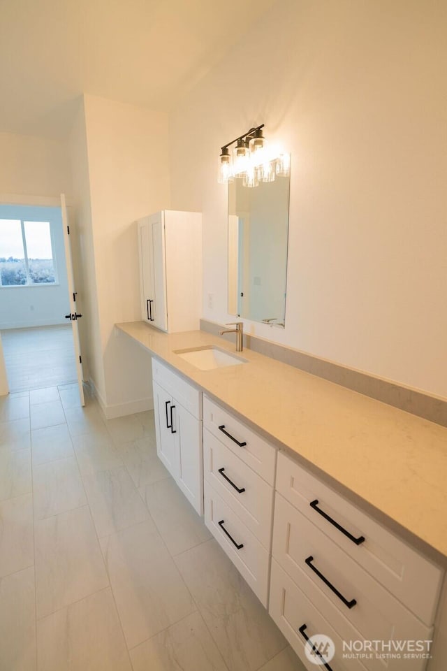 1300 Marina Dr Unit 12, Moses Lake, WA 98837 - bathroom featuring marble finish floor, vanity, and baseboards