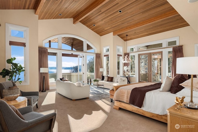 carpeted bedroom featuring french doors, a water view, wood ceiling, and access to exterior