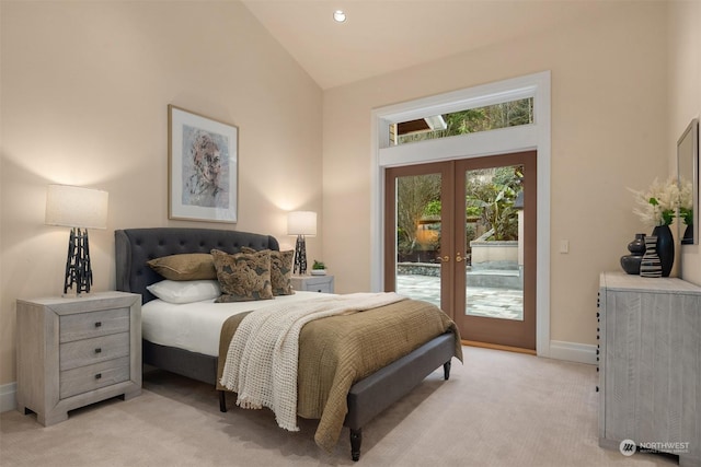 bedroom featuring french doors, access to exterior, high vaulted ceiling, and light carpet