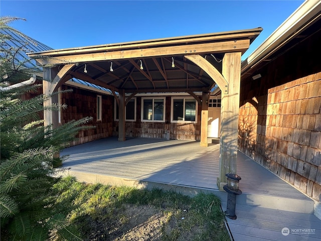 view of patio / terrace featuring a gazebo and a deck