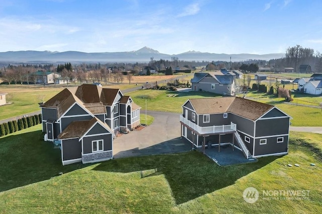 bird's eye view with a mountain view