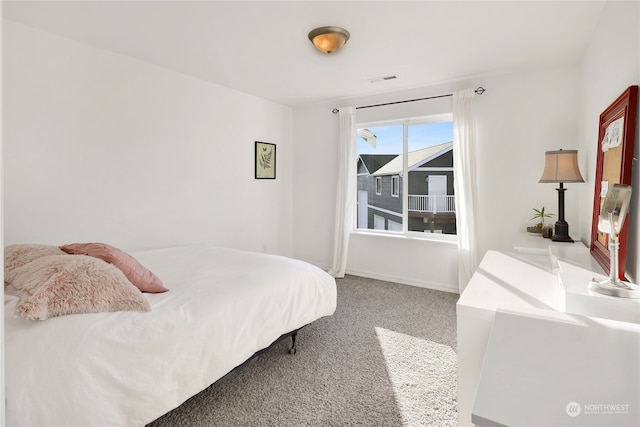 bedroom featuring carpet floors