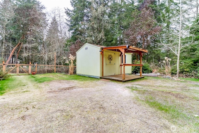 view of outdoor structure with a lawn