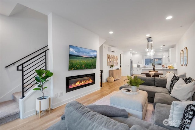 living room with light hardwood / wood-style floors