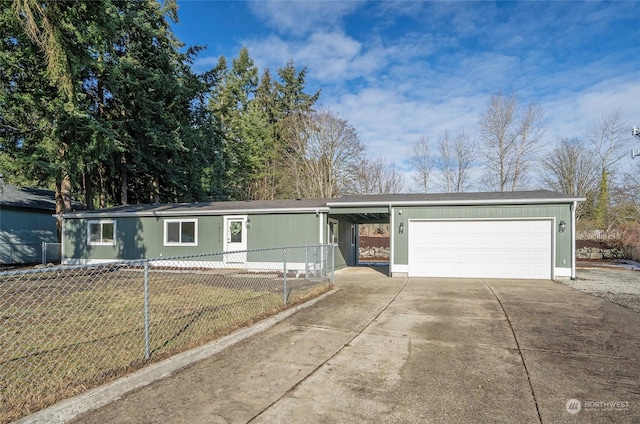 ranch-style house featuring a garage and a front lawn