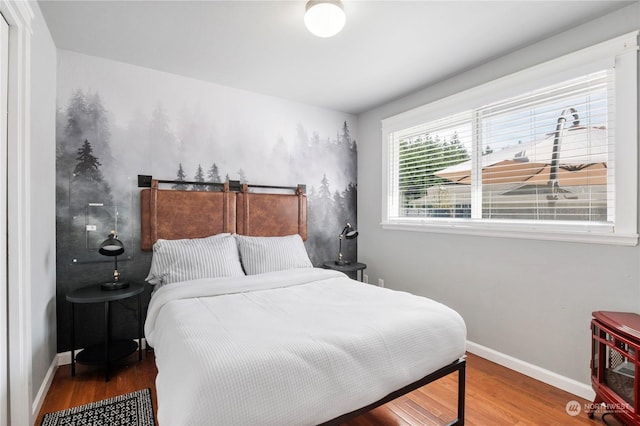 bedroom featuring wood-type flooring