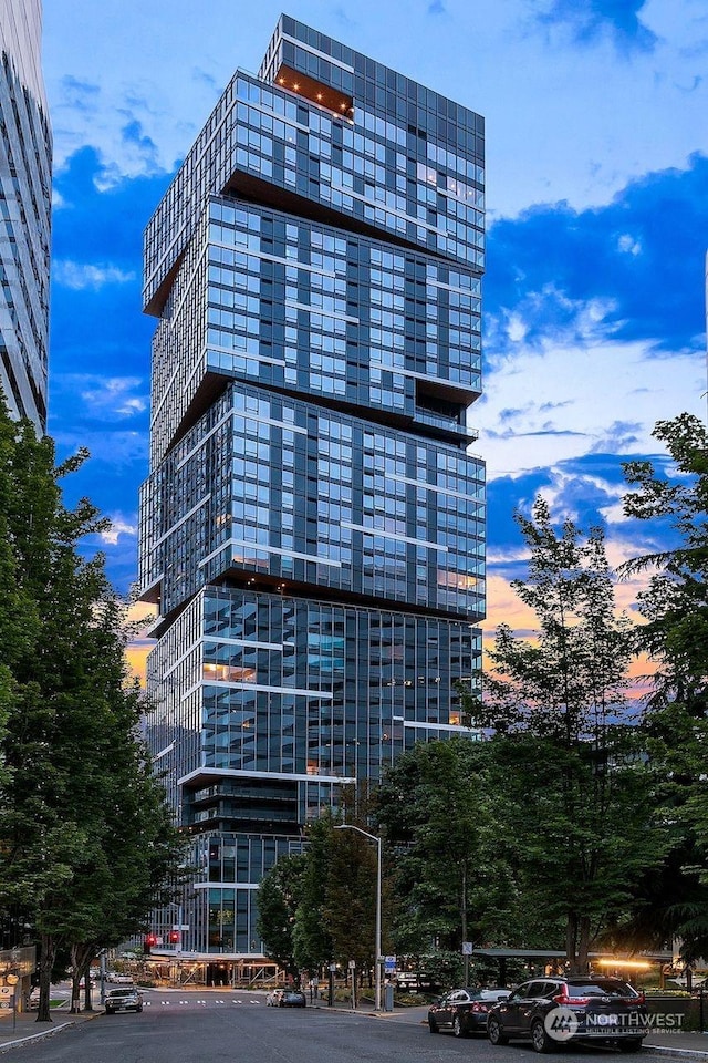 view of outdoor building at dusk