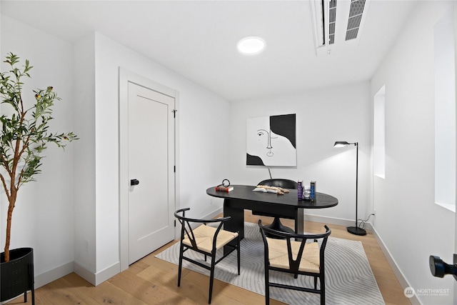 office space featuring light wood-type flooring