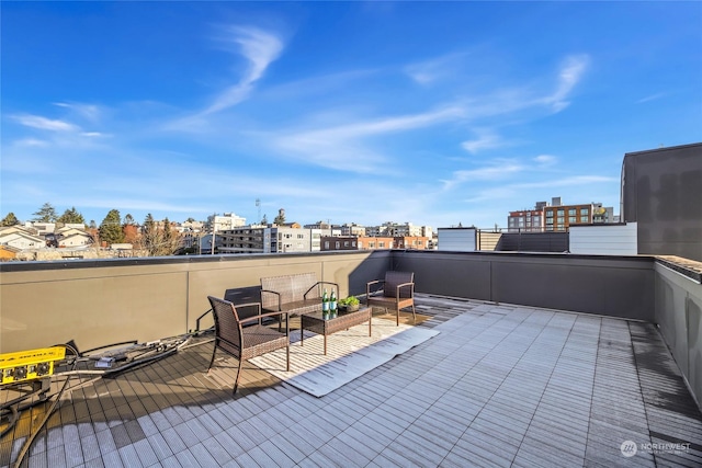 view of patio featuring a balcony