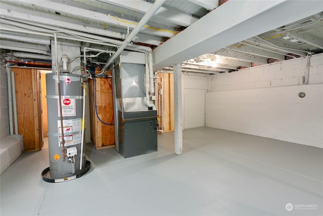 basement with heating unit and water heater