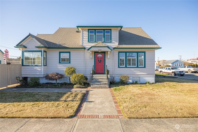 view of front facade with a front lawn