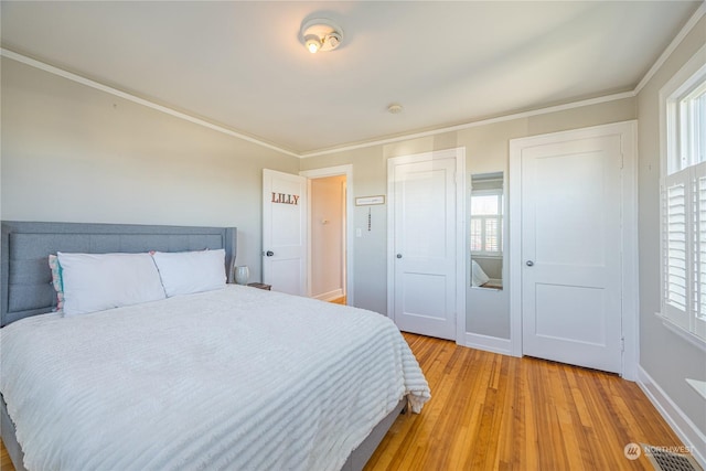 bedroom with light wood-type flooring