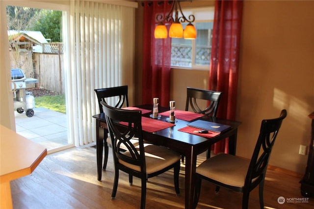 dining space featuring hardwood / wood-style flooring