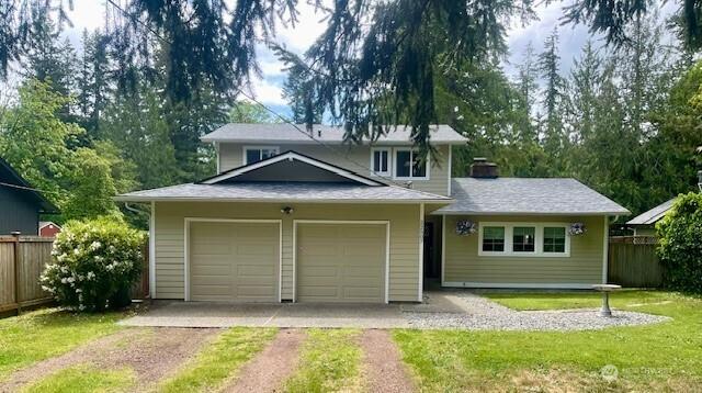 22507 SE 304th Pl, Black Diamond, WA 98010 - view of front of property with driveway and an attached garage