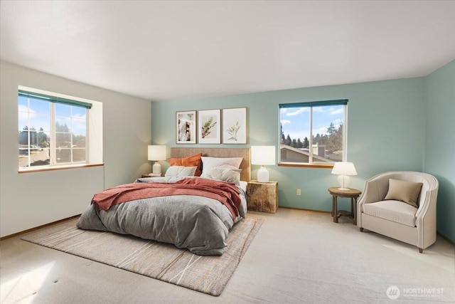 bedroom featuring light carpet