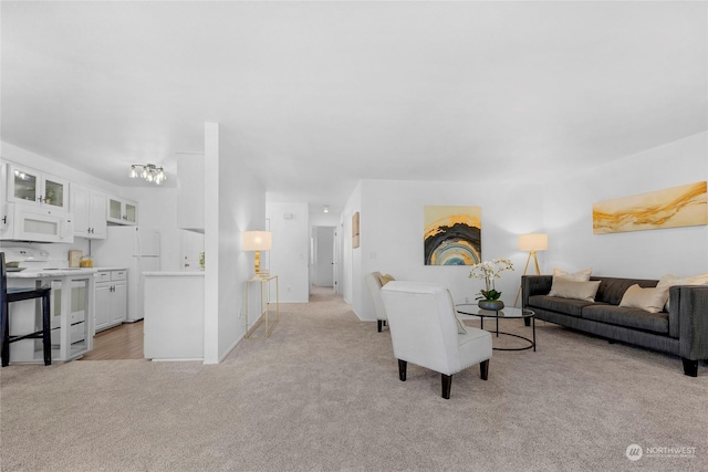 living room with light colored carpet