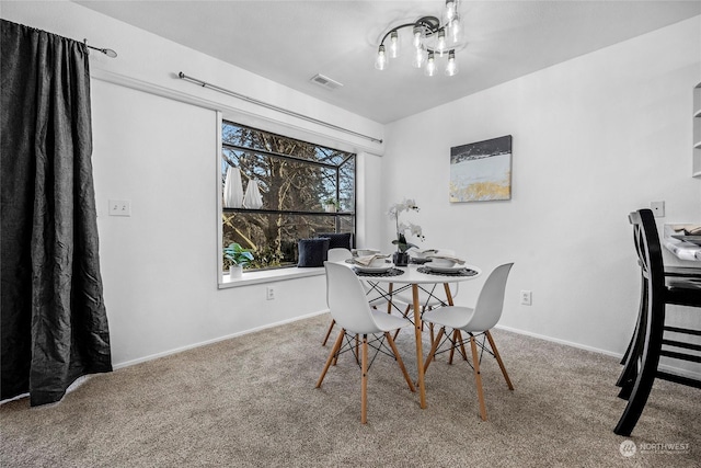 dining room featuring carpet floors