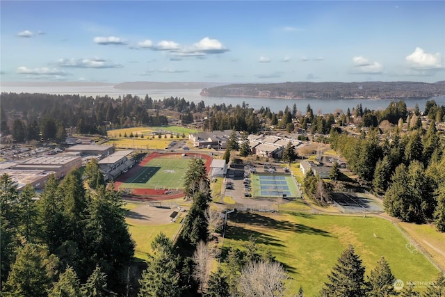 birds eye view of property with a water view