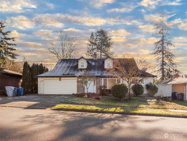 view of front of property featuring a garage