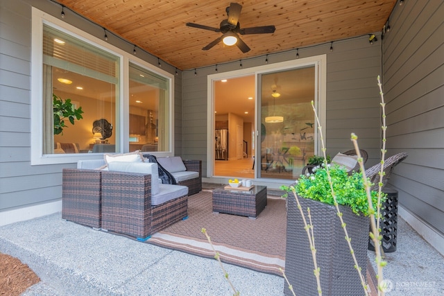 view of patio with outdoor lounge area and ceiling fan