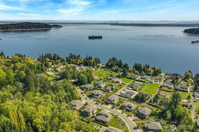 bird's eye view with a residential view and a water view