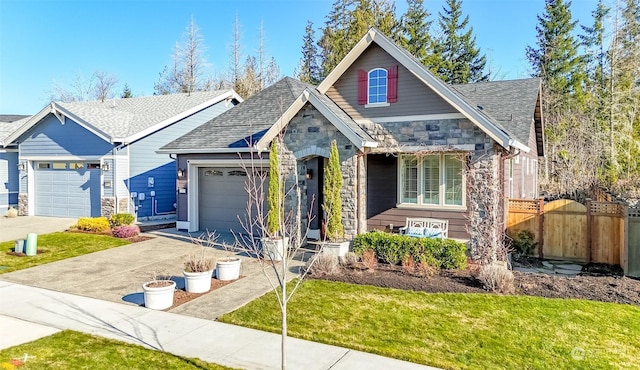 view of front of house featuring a garage and a front yard