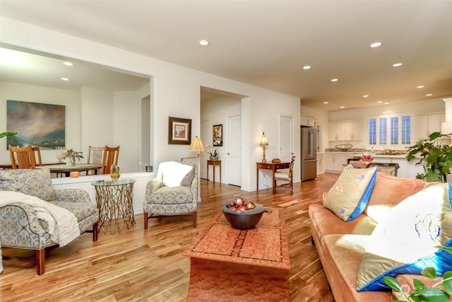 living room with light hardwood / wood-style floors