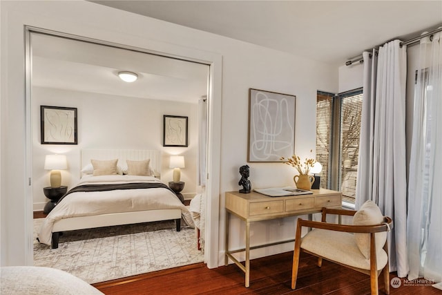 bedroom featuring wood-type flooring