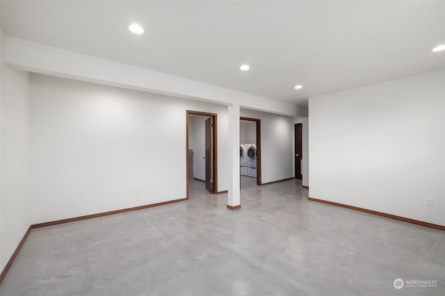 unfurnished room featuring independent washer and dryer