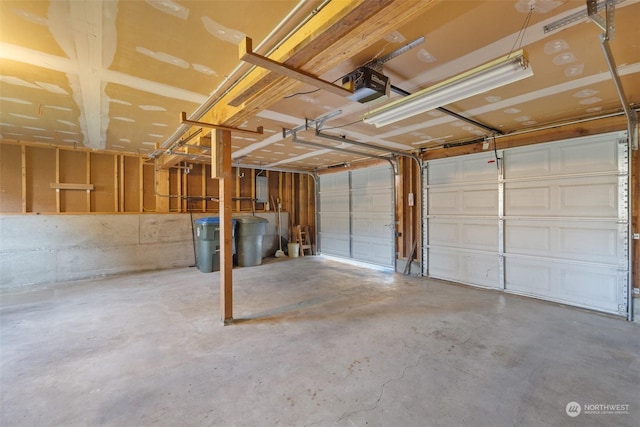 garage featuring a garage door opener