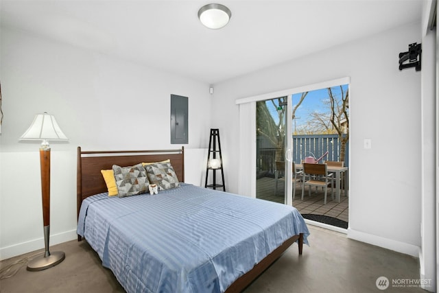 bedroom with access to exterior, electric panel, concrete floors, and baseboards