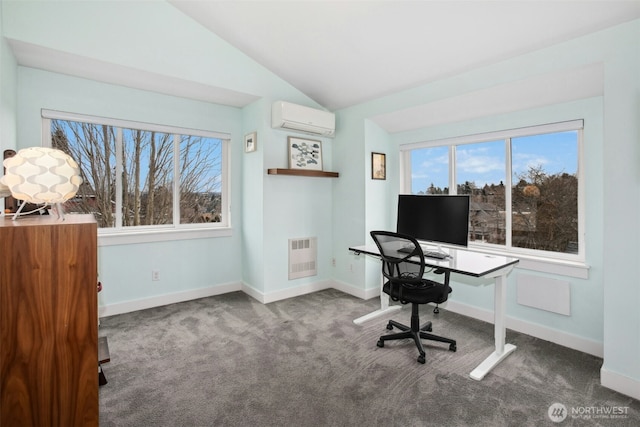 office space featuring lofted ceiling, baseboards, a wall mounted air conditioner, and carpet