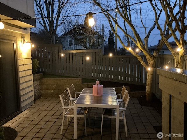 view of patio / terrace with a fenced backyard and outdoor dining space