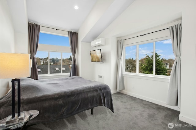 carpeted bedroom with recessed lighting, multiple windows, baseboards, and a wall mounted AC