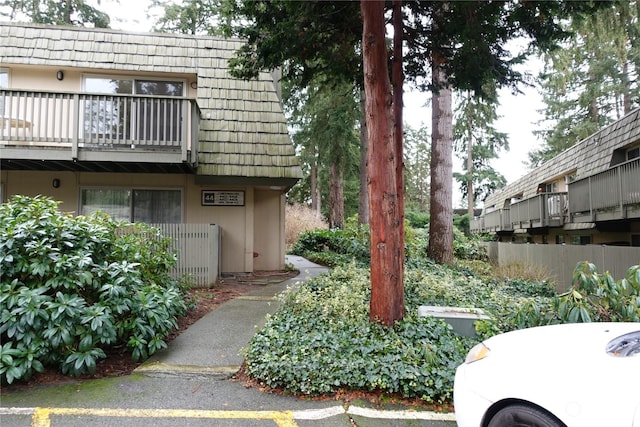 view of property exterior featuring a balcony