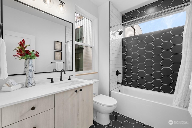 full bathroom with vanity, tile patterned floors, toilet, and shower / bath combo